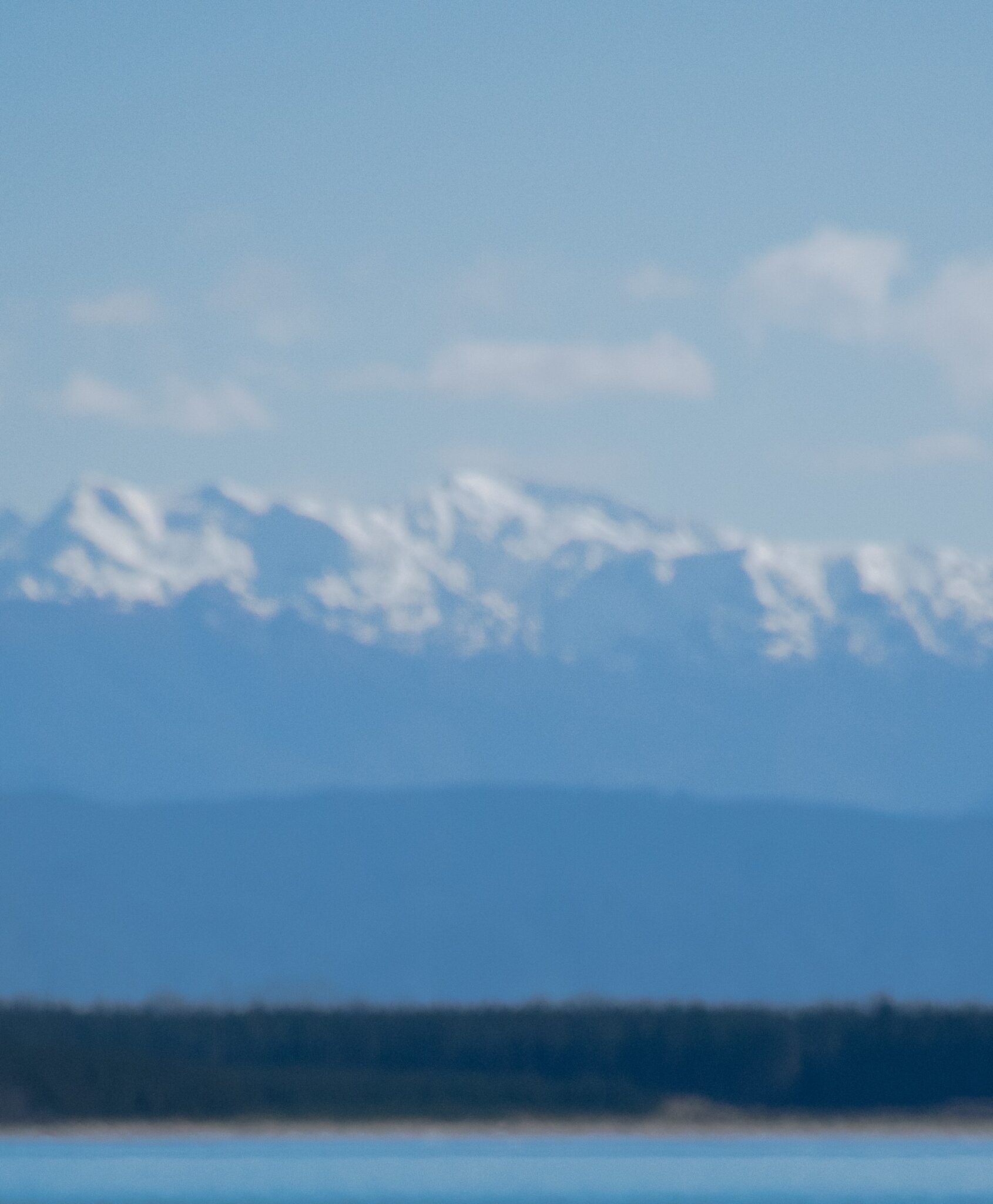 triptych 2 Tuao Wharepapa Mount Arthur range, covered in snow as seen from Tāhunanui back beach, Whakatū Nelson, New Zealand Aotearoa. Photo credit Kahura Gillespie